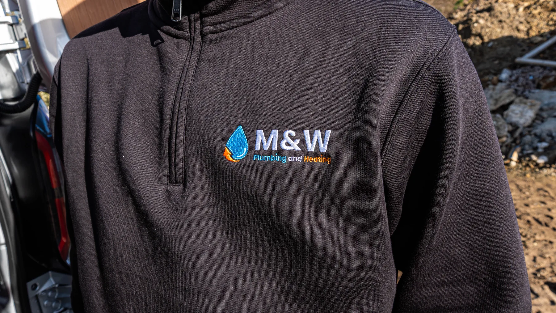 M&W Plumbing and Heating team working in Jersey