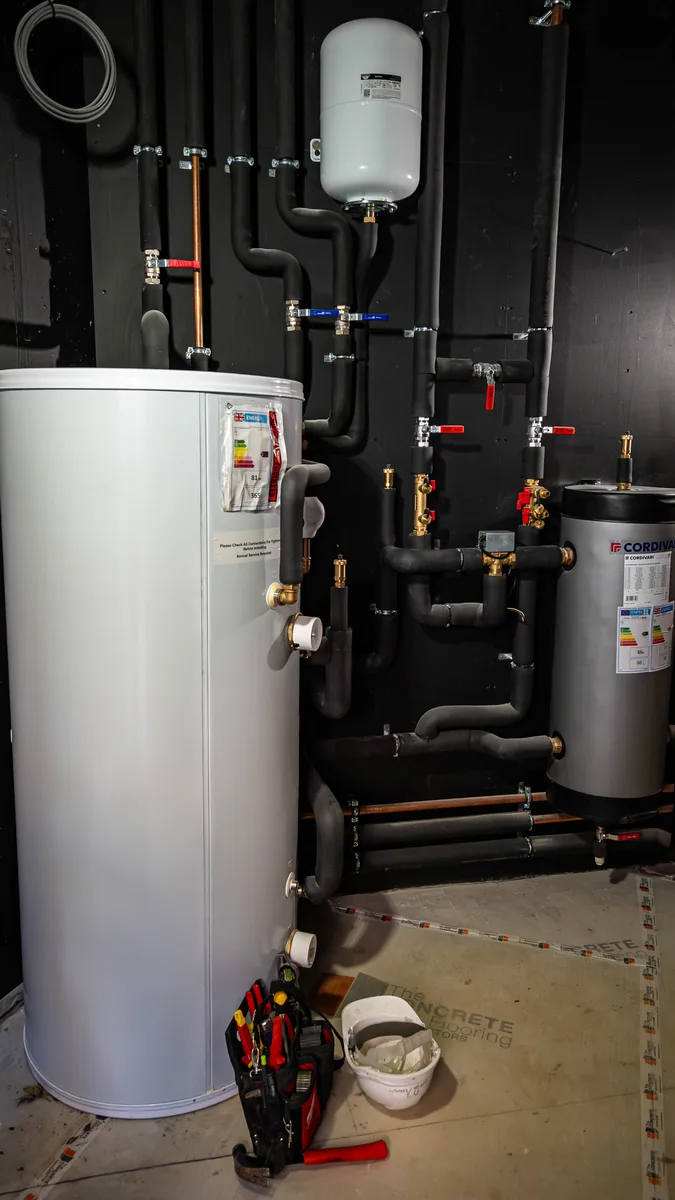 M&W Plumbing and Heating team working in Jersey